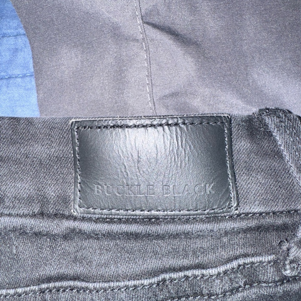 Women’s skinny buckle black jean